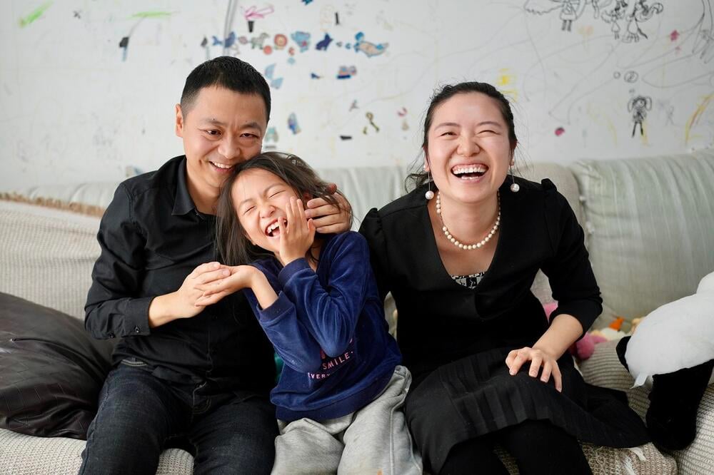 Cai Cong with his daughter and wife. ©UNFPA China/Liang Si