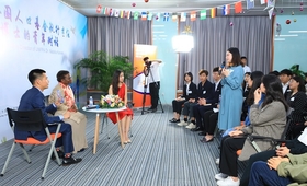 A youth representative sharing her story with Dr. Natalia Kanem on her participation in the UNFPA Leadership Project in Beijing on 25 April 2019. Photo credit: BIEG